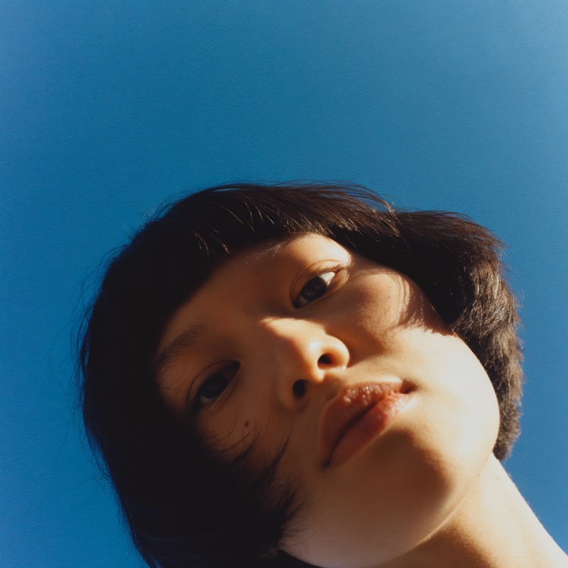 Cinematic portrait — warm grain, intimate composition